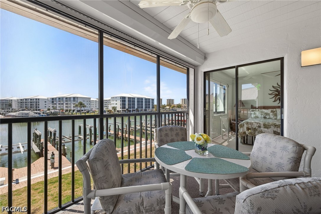 200 Lenell Road, Unit 222 Fort Myers Beach, FL 33931 - Photo 17 of 33 a view of a dining room with furniture window and outside view
