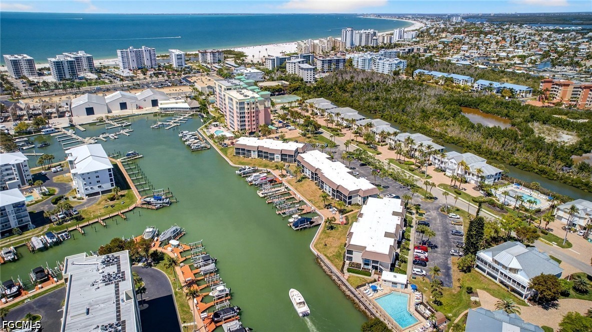 200 Lenell Road, Unit 222 Fort Myers Beach, FL 33931 - Photo 30 of 33 an aerial view of residential houses with outdoor space