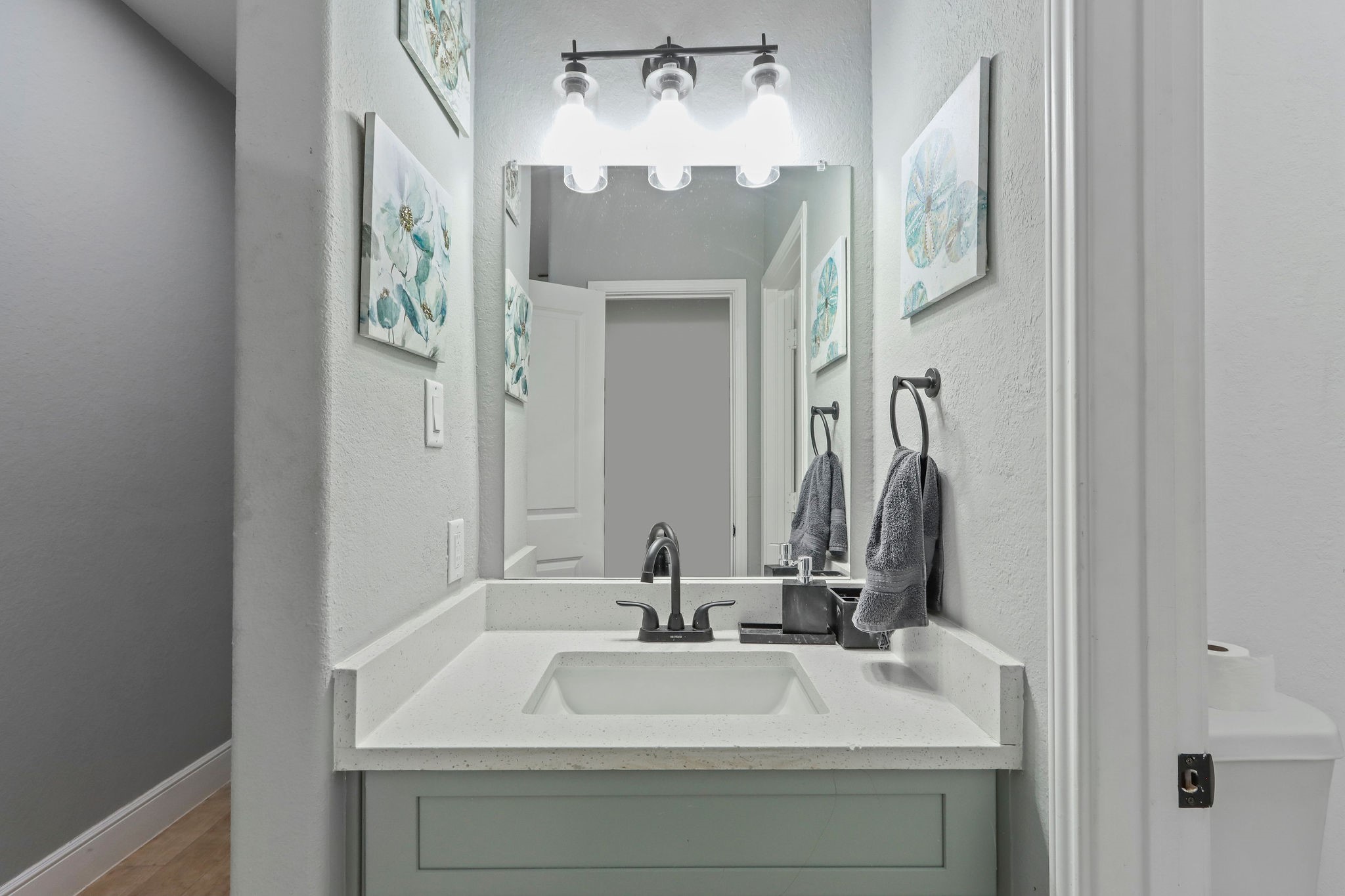 5607 Bacher Street, Unit B Houston, TX 77028 - Photo 11 of 22 a bathroom with a sink and a mirror