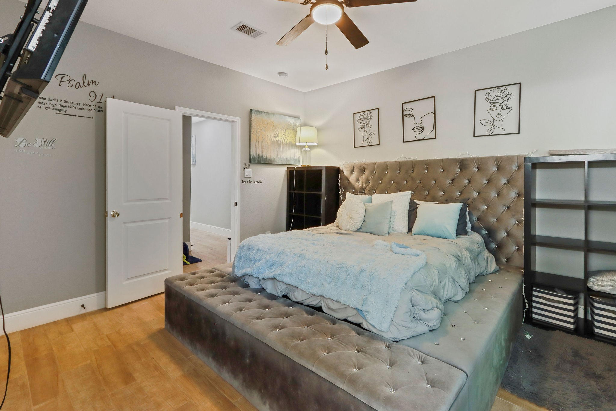 5607 Bacher Street, Unit B Houston, TX 77028 - Photo 16 of 22 a bedroom with a bed and painting on the wall