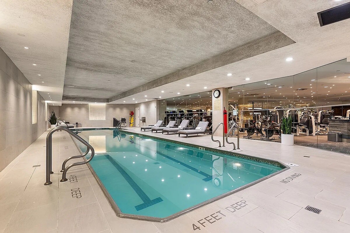 1 Central Park West, Unit 38C Manhattan, NY 10023 - Photo 13 of 24 a view of a swimming pool and outdoor seating
