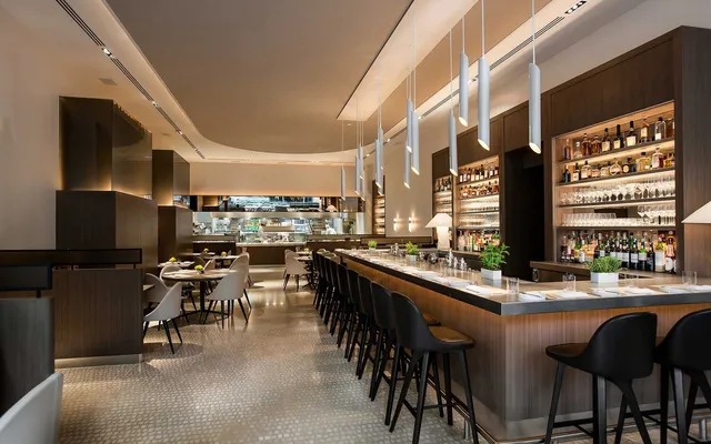 a view of a door and brick wall