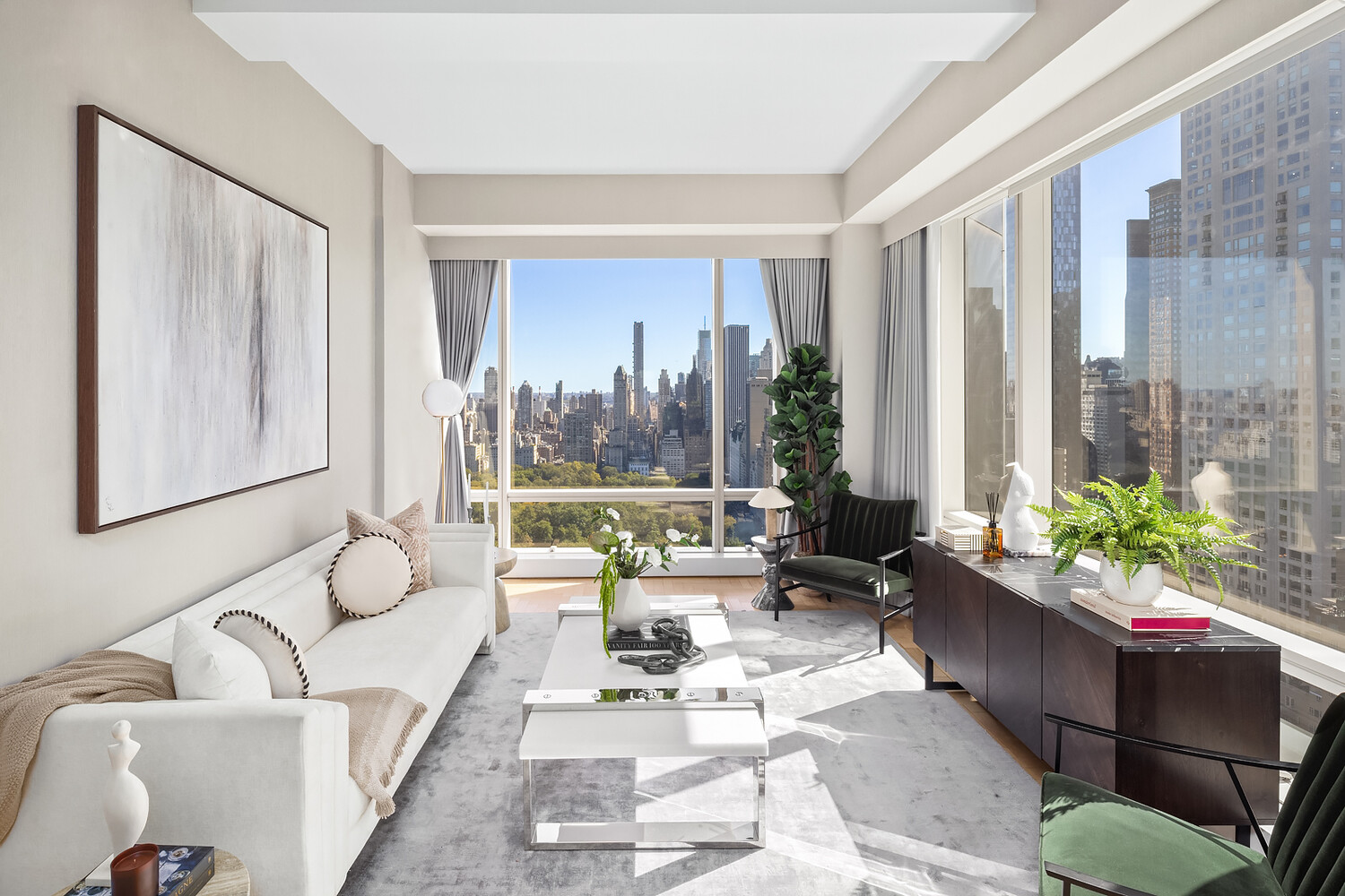 1 Central Park West, Unit 38C Manhattan, NY 10023 - Photo 2 of 24 a living room with furniture and a large window