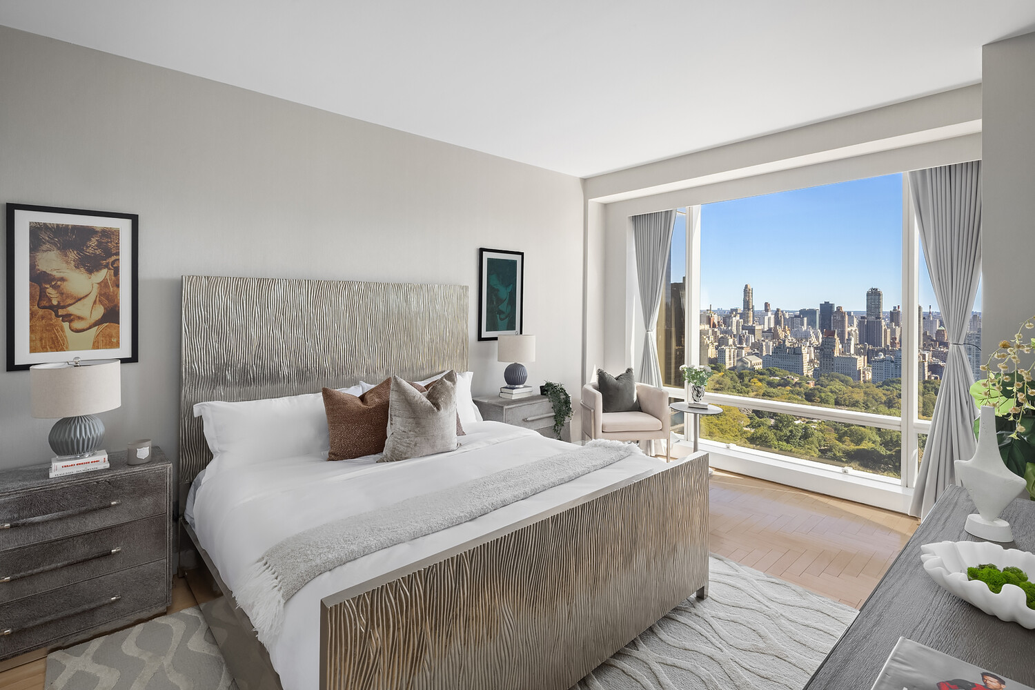 1 Central Park West, Unit 38C Manhattan, NY 10023 - Photo 9 of 24 a bedroom with a large bed and a large window