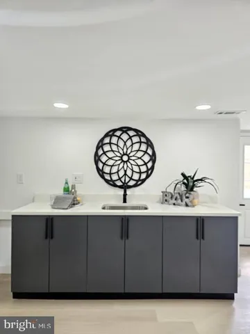a sink with a cabinets