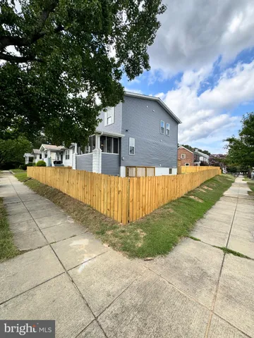 a view of a backyard of the house