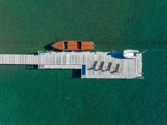 a view of a deck with a big yard