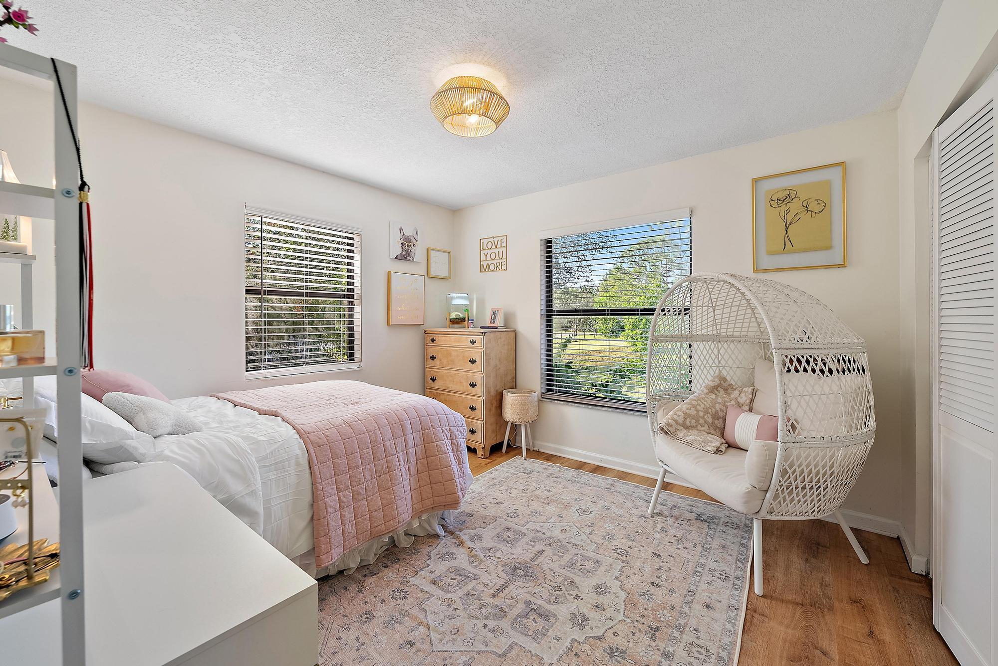 16766 123rd Terrace North Jupiter, FL 33478 - Photo 15 of 26 a bed room with a bed and a window