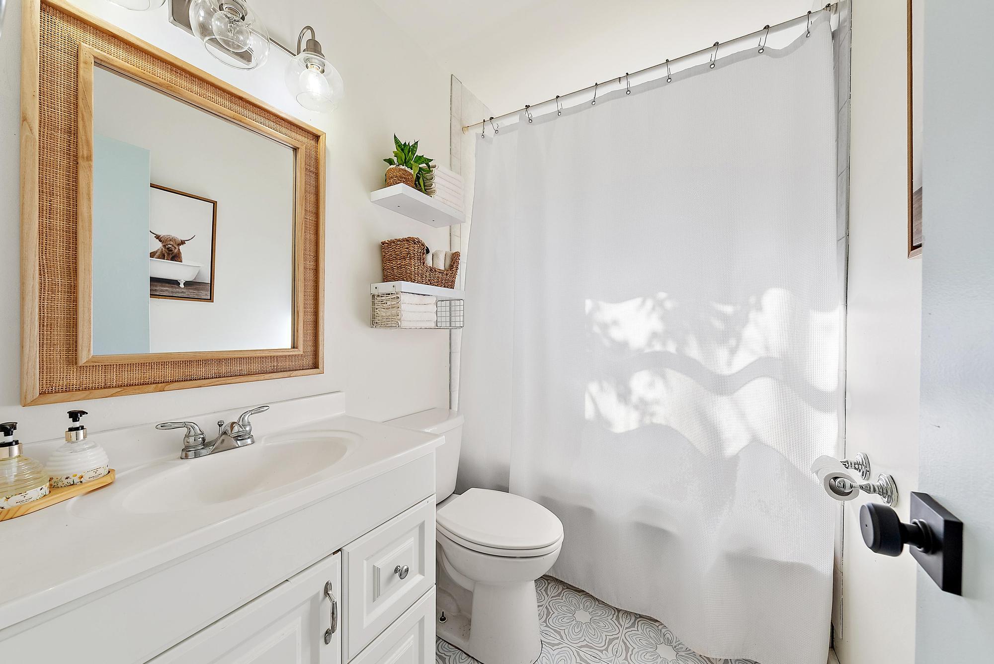 16766 123rd Terrace North Jupiter, FL 33478 - Photo 17 of 26 a bathroom with a sink vanity granite and toilet