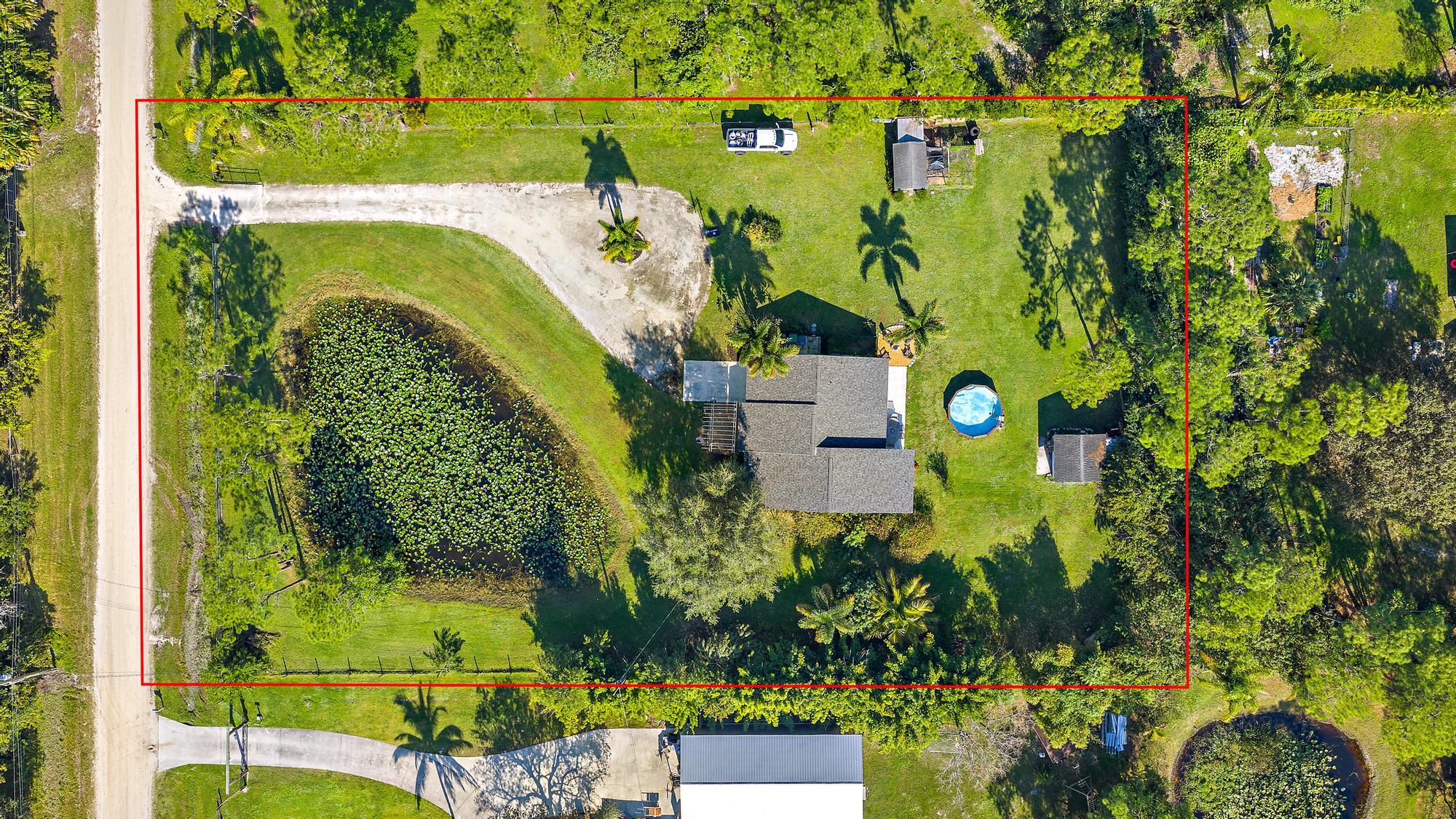 16766 123rd Terrace North Jupiter, FL 33478 - Photo 24 of 26 a bird view of a garden