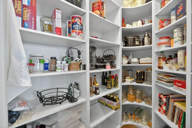 an aerial view of a house with a swimming pool