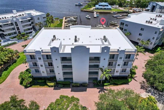 a aerial view of multi story residential apartment building