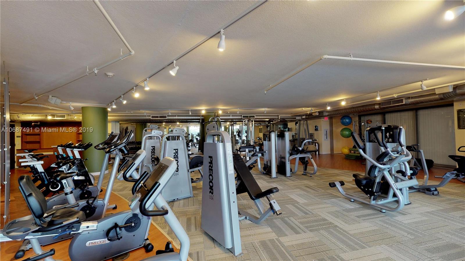 2641 North Flamingo Road, Unit 1401N Plantation, FL 33323 - Photo 11 of 49 a view of a room with gym equipment