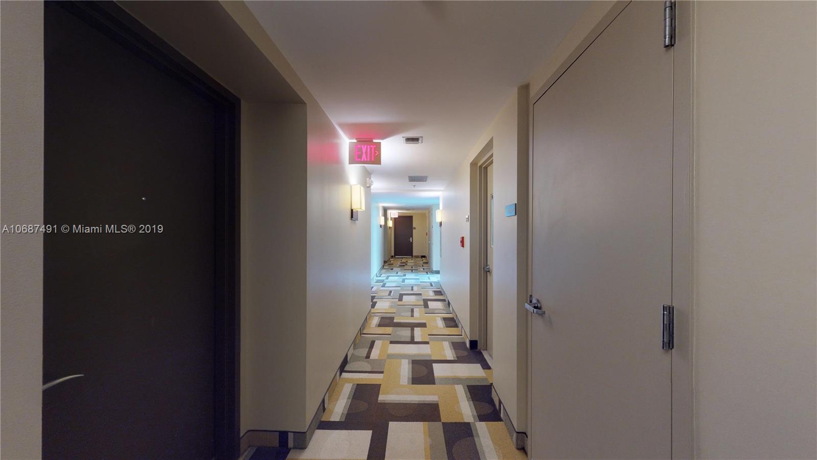 2641 North Flamingo Road, Unit 1401N Plantation, FL 33323 - Photo 18 of 49 a view of a hallway