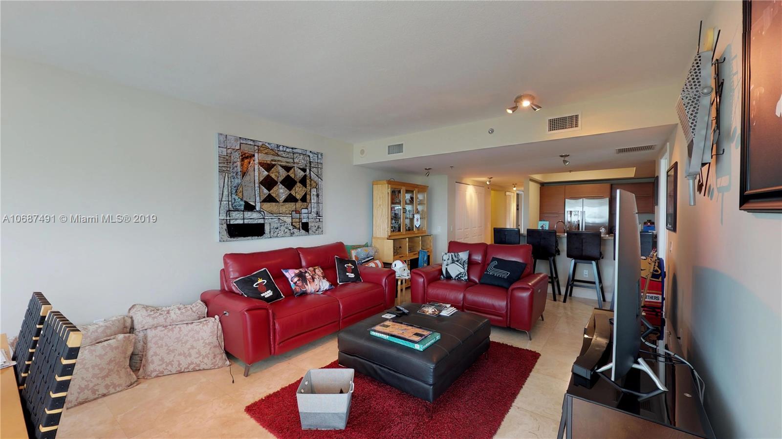 2641 North Flamingo Road, Unit 1401N Plantation, FL 33323 - Photo 32 of 49 a living room with furniture and a couch