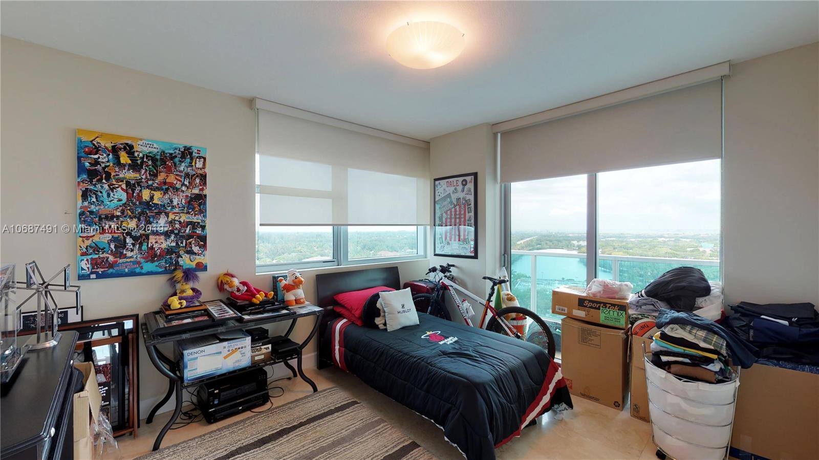 2641 North Flamingo Road, Unit 1401N Plantation, FL 33323 - Photo 43 of 49 a living room with furniture and a large window