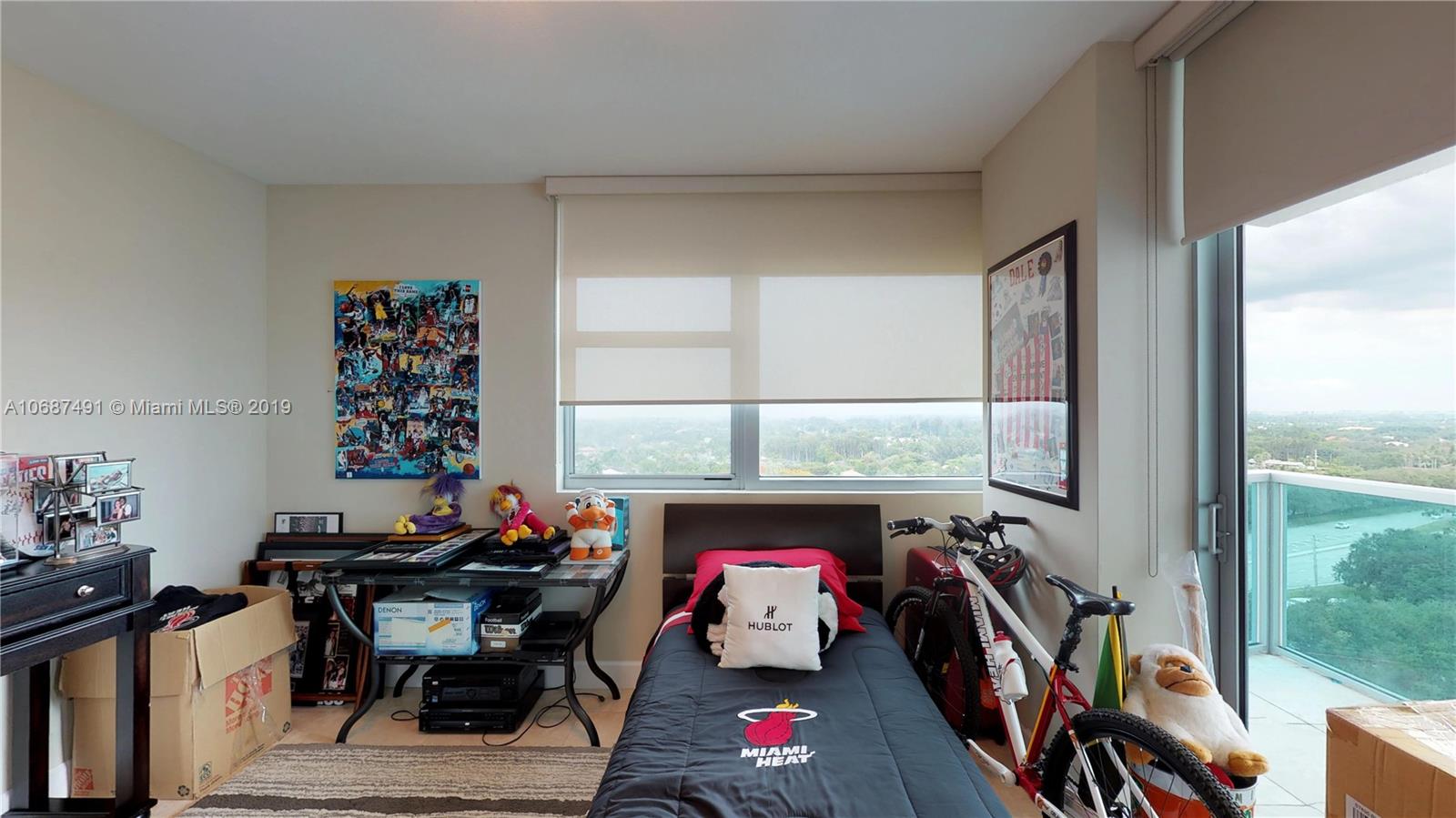 2641 North Flamingo Road, Unit 1401N Plantation, FL 33323 - Photo 44 of 49 a living room with furniture fireplace and a window