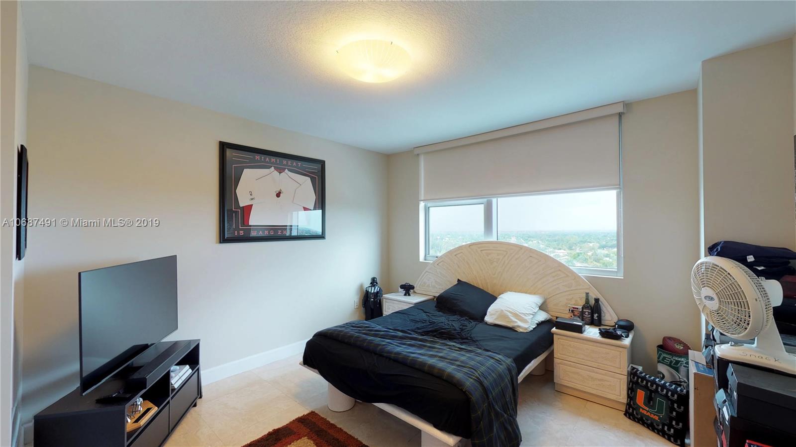 2641 North Flamingo Road, Unit 1401N Plantation, FL 33323 - Photo 48 of 49 a living room with furniture and a window