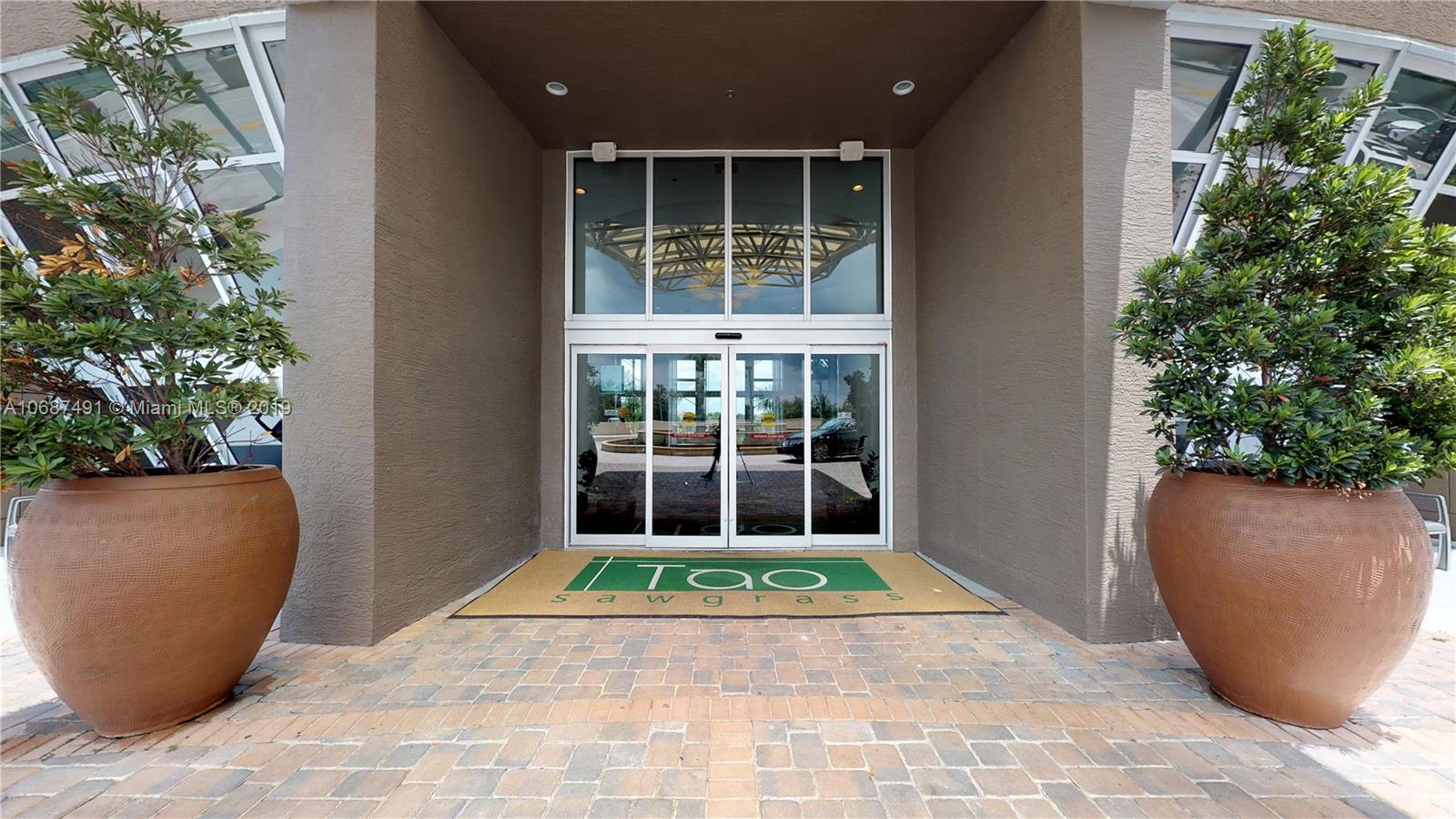 2641 North Flamingo Road, Unit 1401N Plantation, FL 33323 - Photo 7 of 49 a view of outdoor space yard and patio