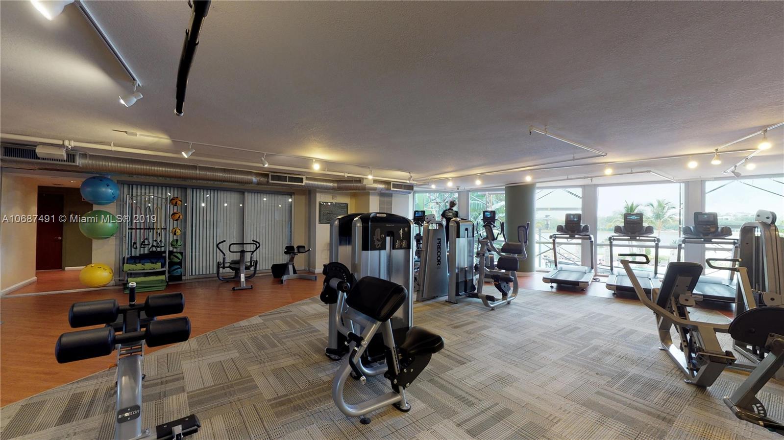 2641 North Flamingo Road, Unit 1401N Plantation, FL 33323 - Photo 10 of 49 a view of a room with gym equipment