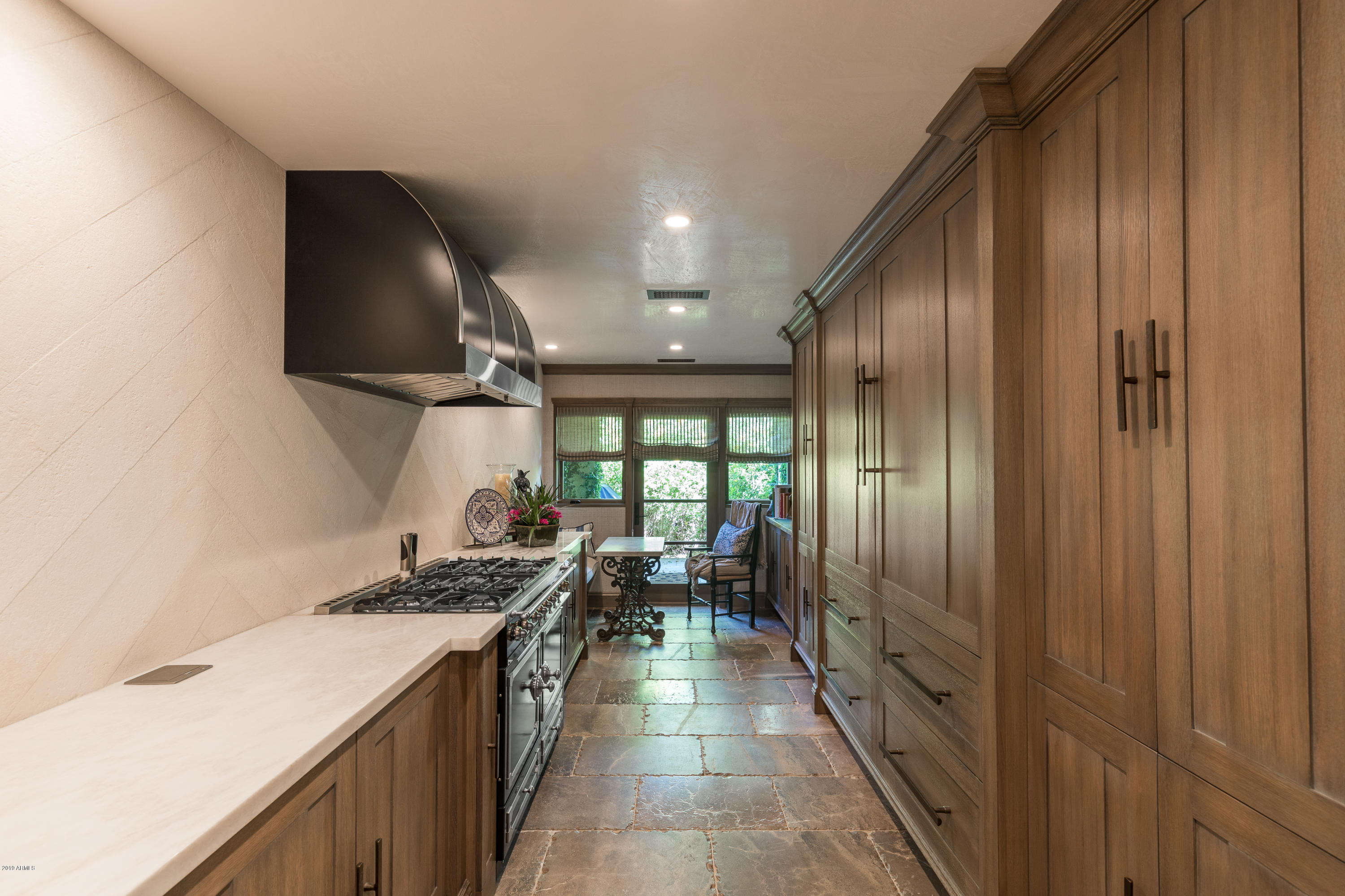 7225 East Valley View Road Scottsdale, AZ 85250 - Photo 14 of 28 Kitchen to Pocket Patio