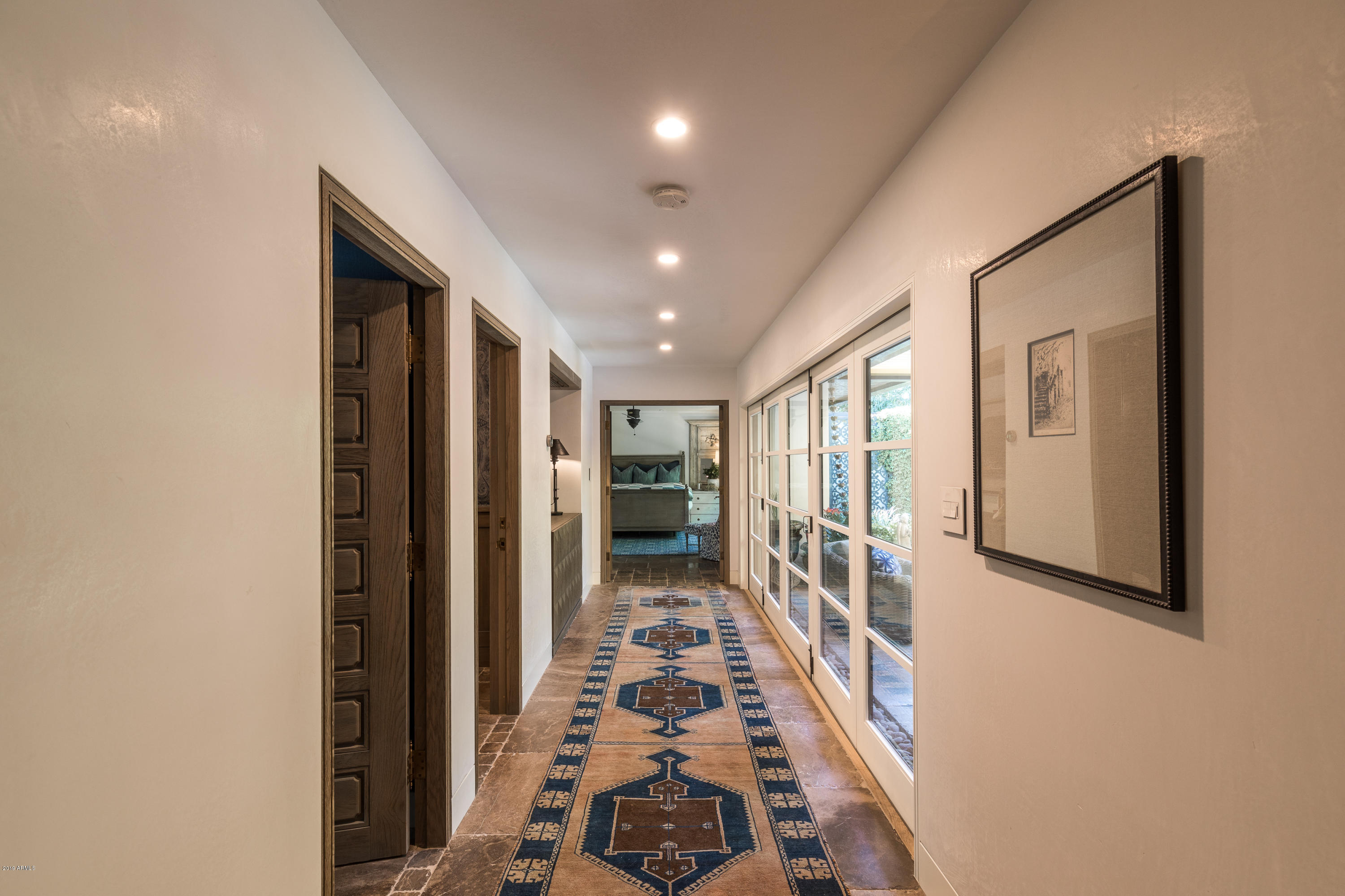 7225 East Valley View Road Scottsdale, AZ 85250 - Photo 17 of 28 Glass walled hallway