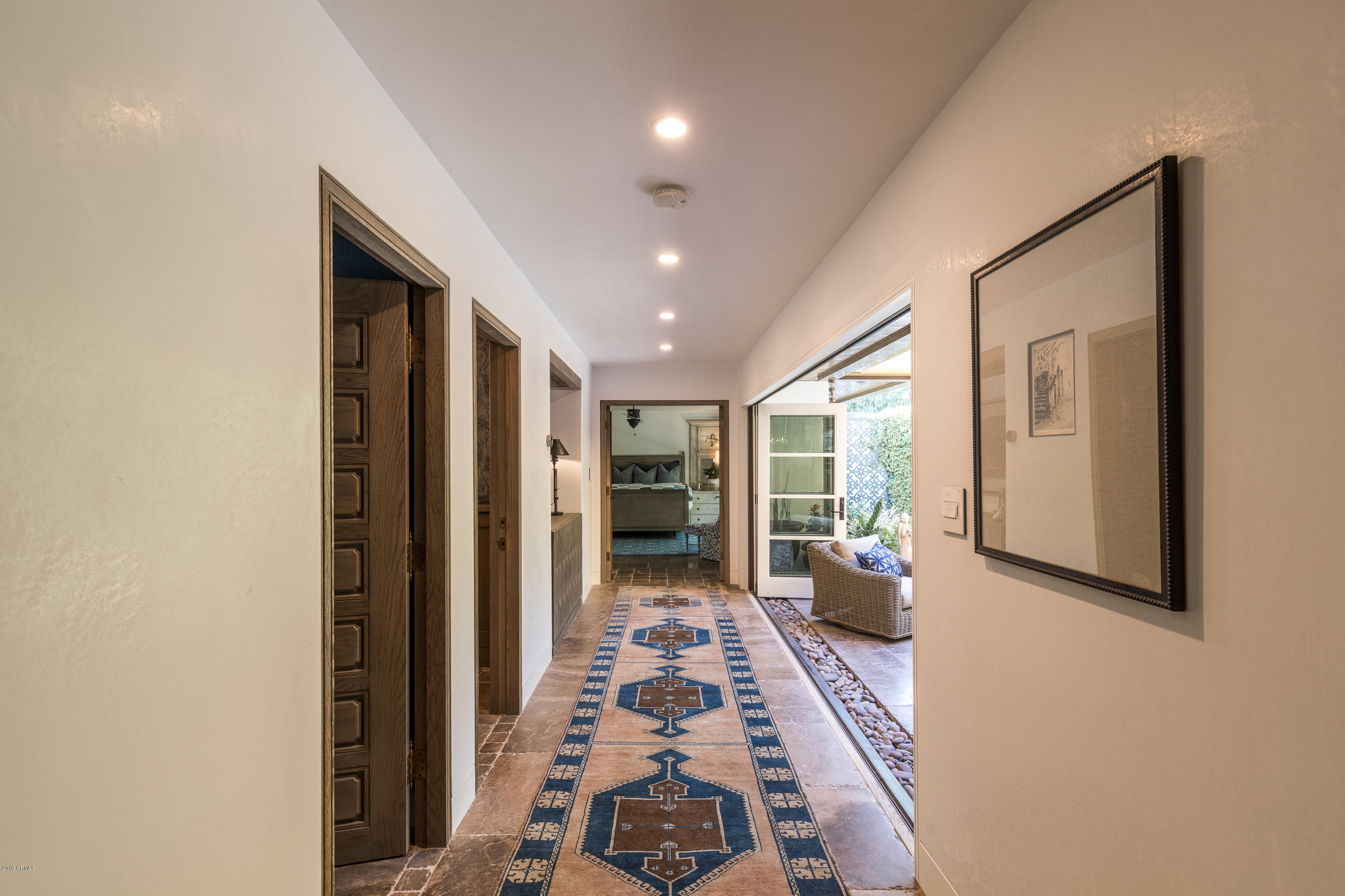 7225 East Valley View Road Scottsdale, AZ 85250 - Photo 18 of 28 Hallway open to Patio