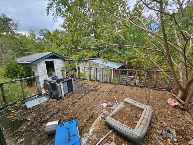 a view of a yard with furniture and outdoor space