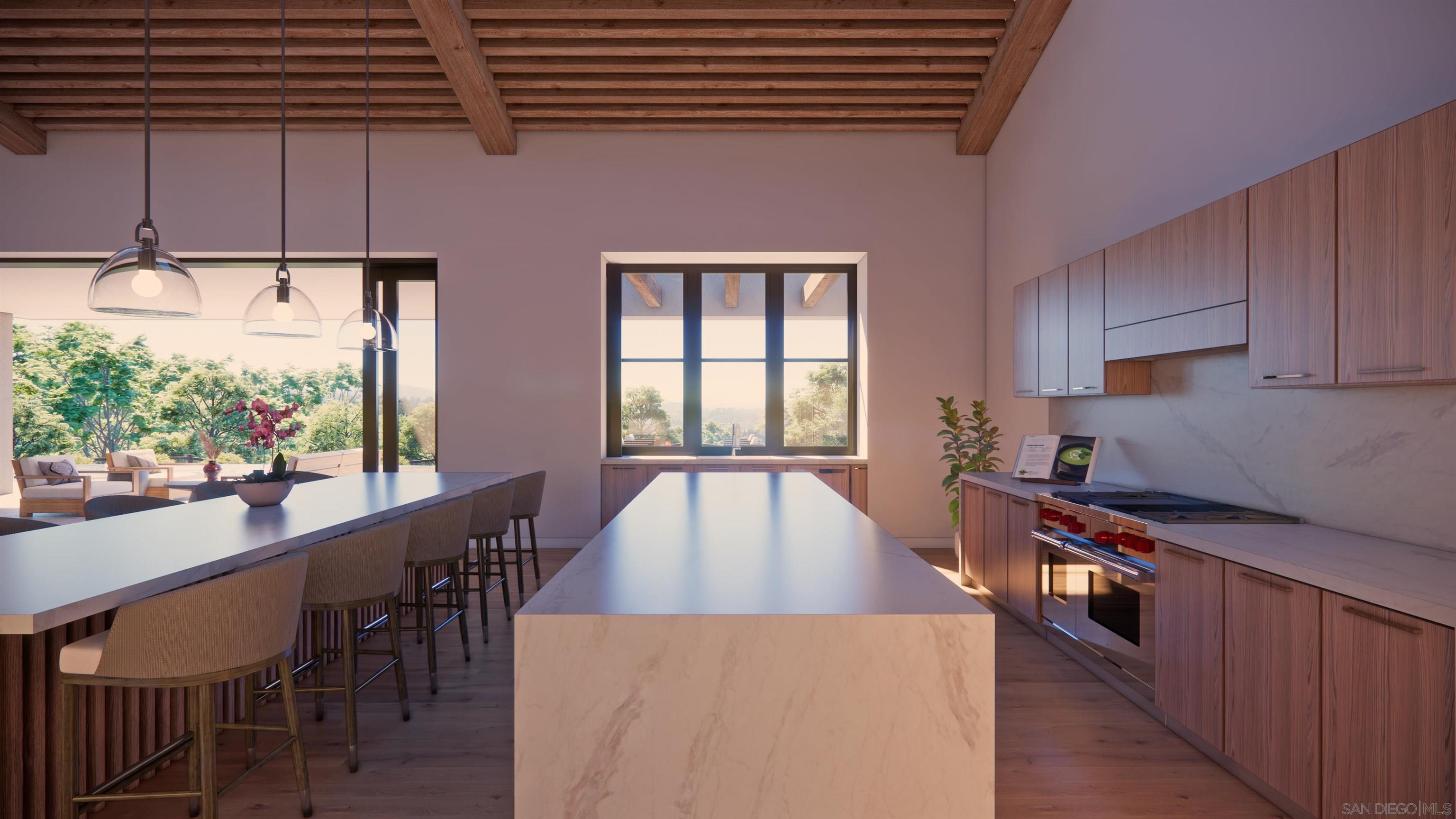 16256 Via Del Alba Rancho Santa Fe, CA 92067 - Photo 22 of 64 a kitchen with stainless steel appliances granite countertop a stove a refrigerator a kitchen island a sink dishwasher and white cabinets with wooden floor
