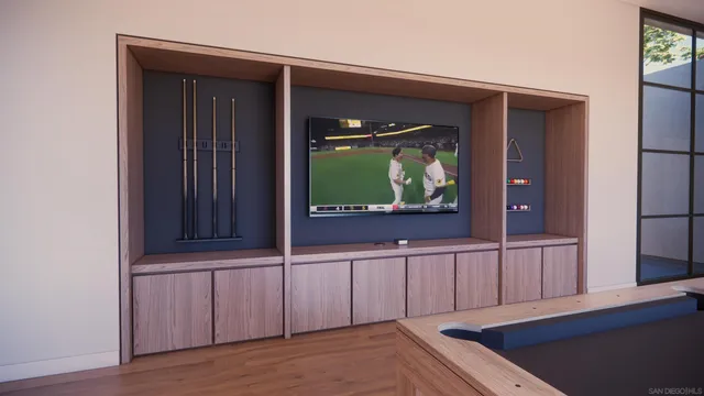 a large en suite bathroom with a double vanity sink a large mirror and a bathtub