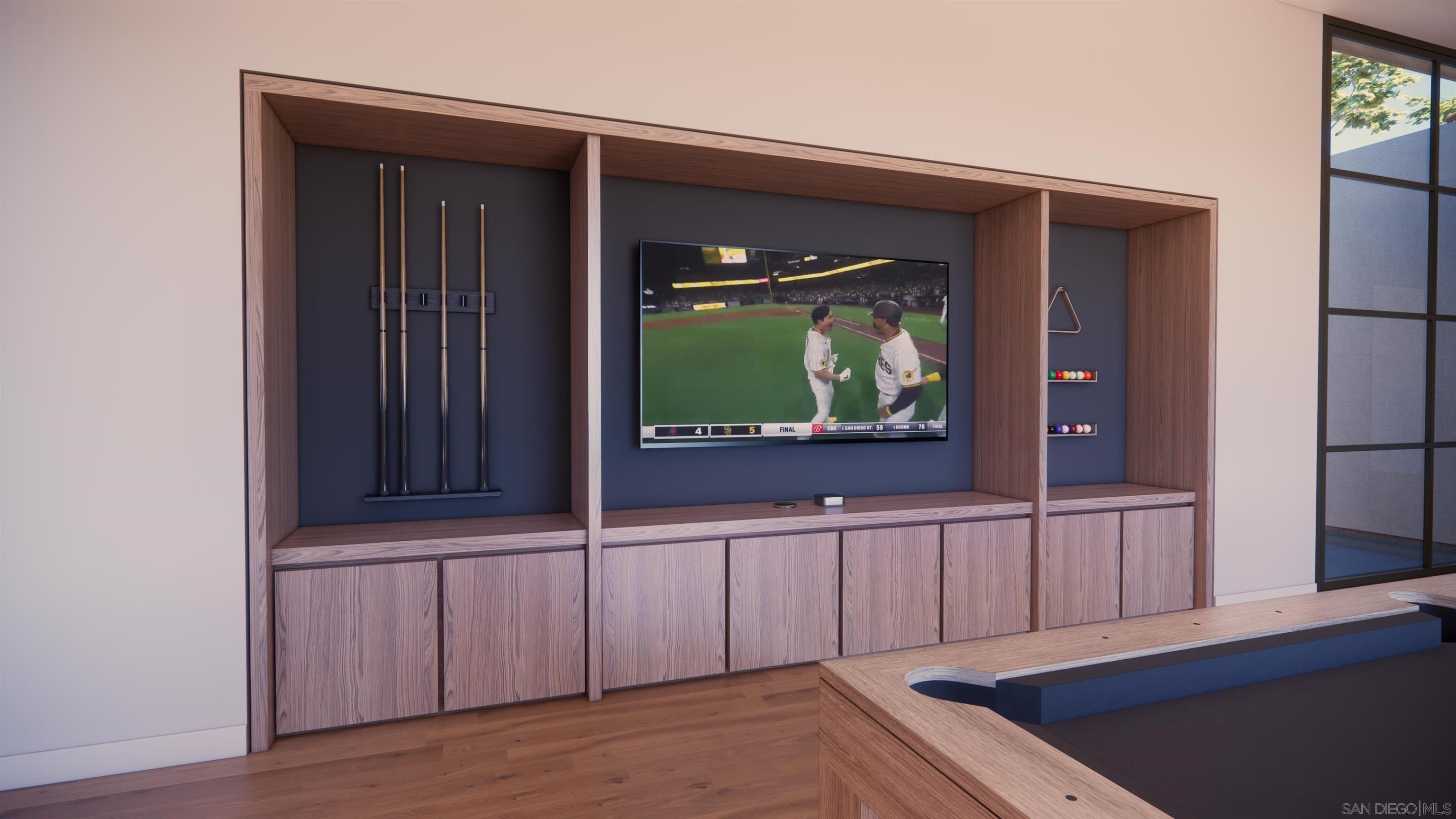 16256 Via Del Alba Rancho Santa Fe, CA 92067 - Photo 27 of 64 a living room with wooden floor and flat screen tv