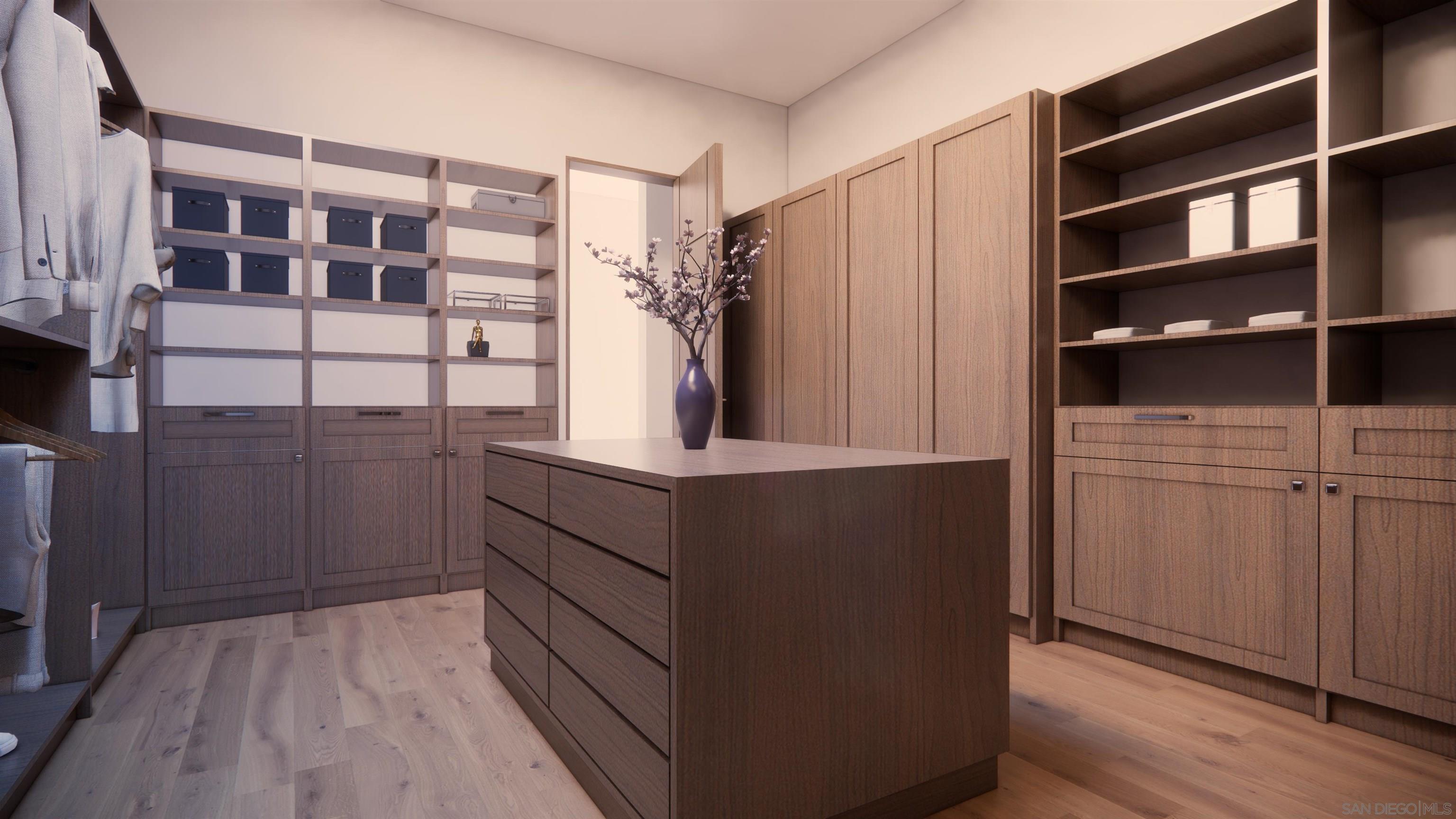 16256 Via Del Alba Rancho Santa Fe, CA 92067 - Photo 40 of 64 a kitchen with a refrigerator and cabinets
