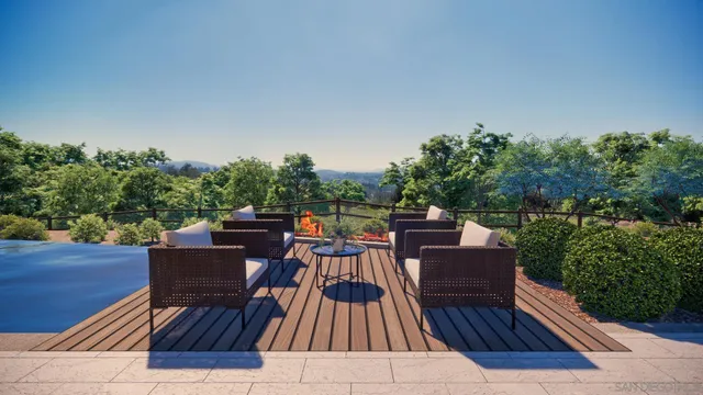 a view of a backyard with plants and trees