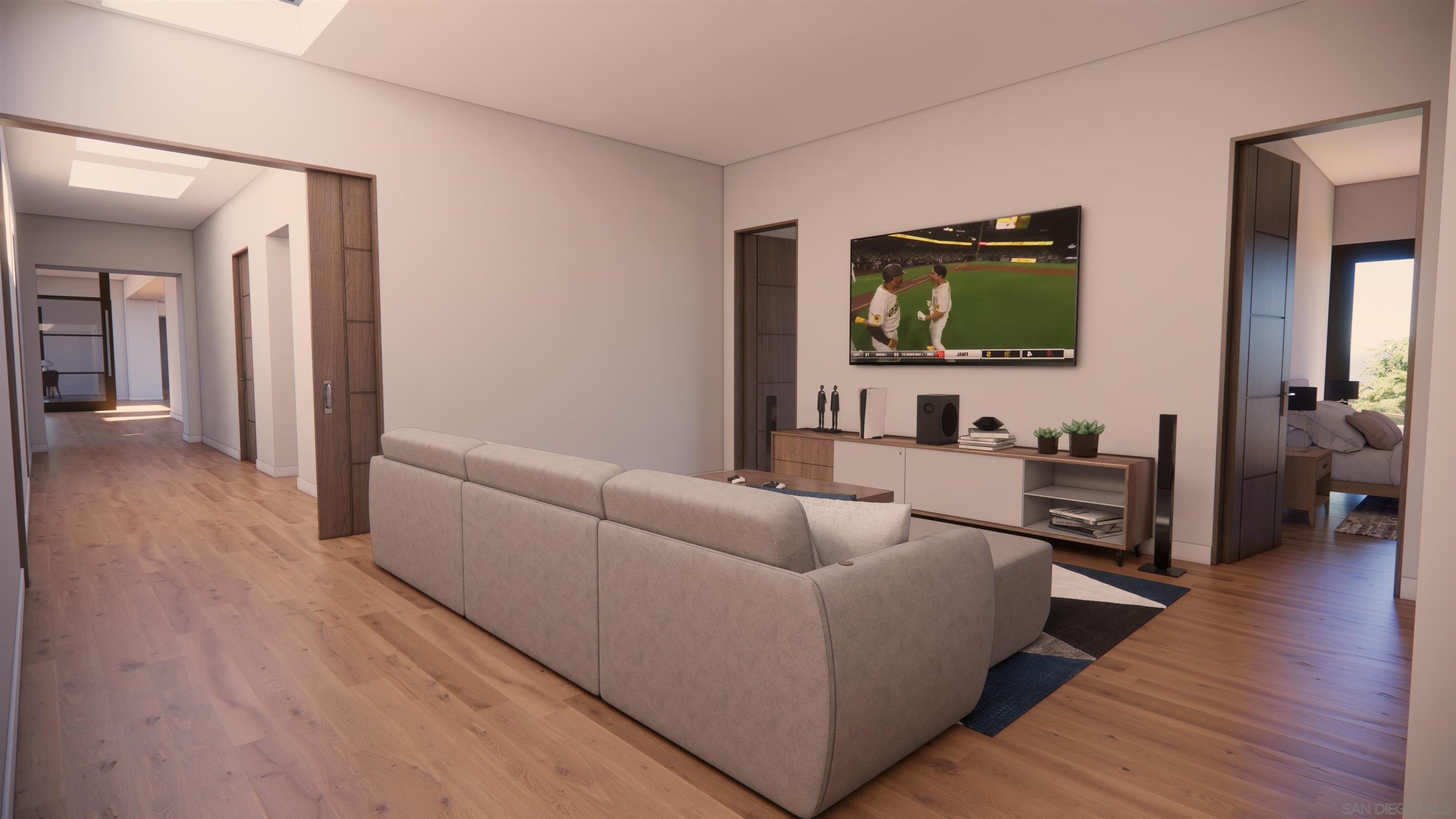 16256 Via Del Alba Rancho Santa Fe, CA 92067 - Photo 43 of 64 a living room with furniture and a flat screen tv