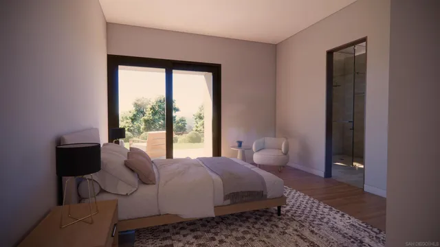 a living room with patio furniture and a flat screen tv