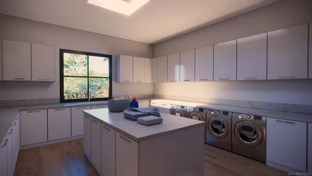 a bathroom with a shower sink vanity mirror and toilet