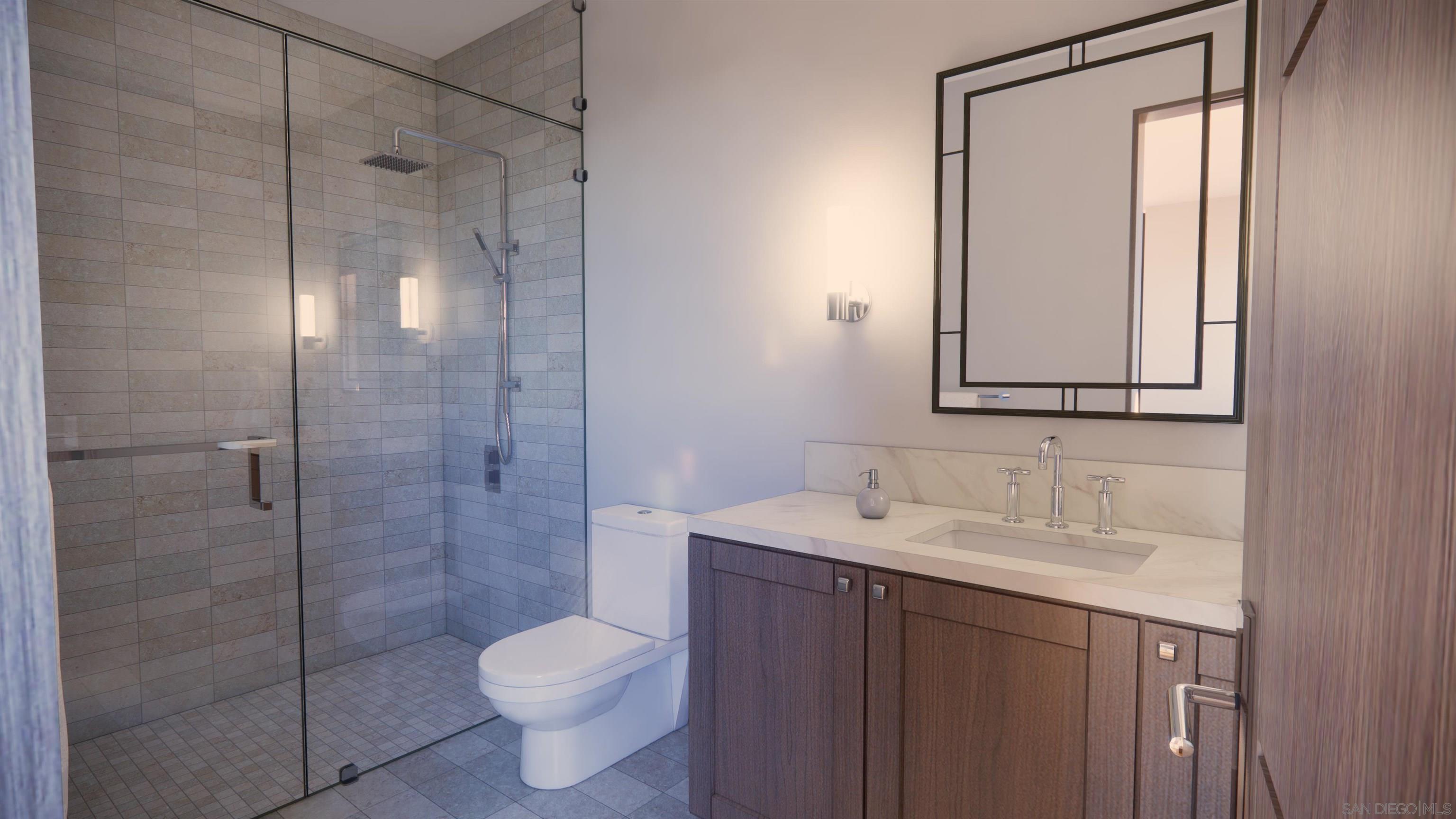 16256 Via Del Alba Rancho Santa Fe, CA 92067 - Photo 63 of 64 a bathroom with a shower sink vanity mirror and toilet