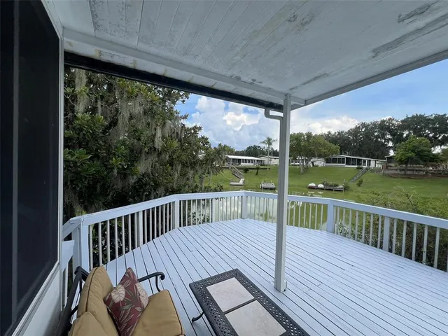 a view of a lake with a big yard