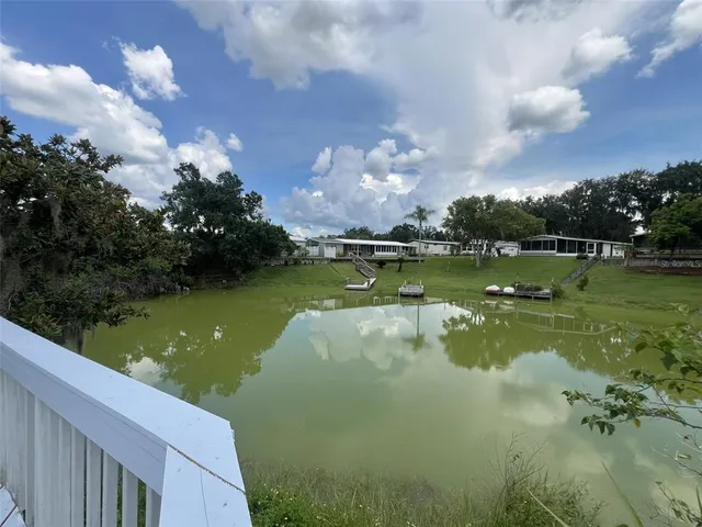 a kitchen with stainless steel appliances granite countertop a stove and a refrigerator