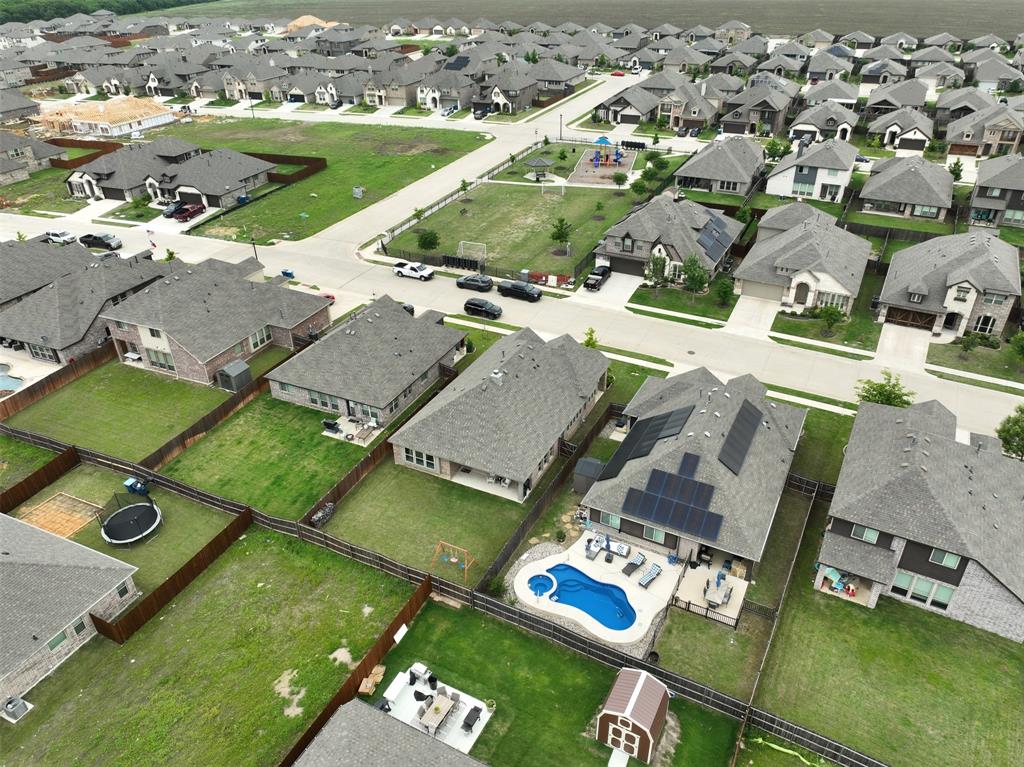 1084 Imperial Eagle Road Alvarado, TX 76009 - Photo 39 of 39 an aerial view of residential houses with outdoor space