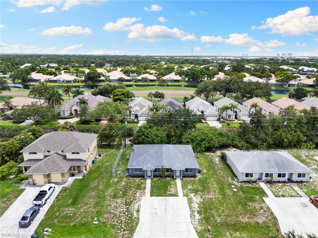 8264-8268 Matanzas Road Fort Myers, FL 33967 - Photo 32 of 33 an aerial view of residential houses with outdoor space and street view