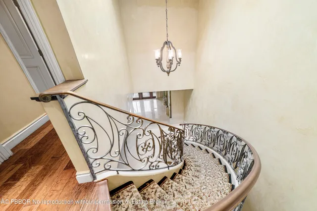 a kitchen with granite countertop a sink and cabinets