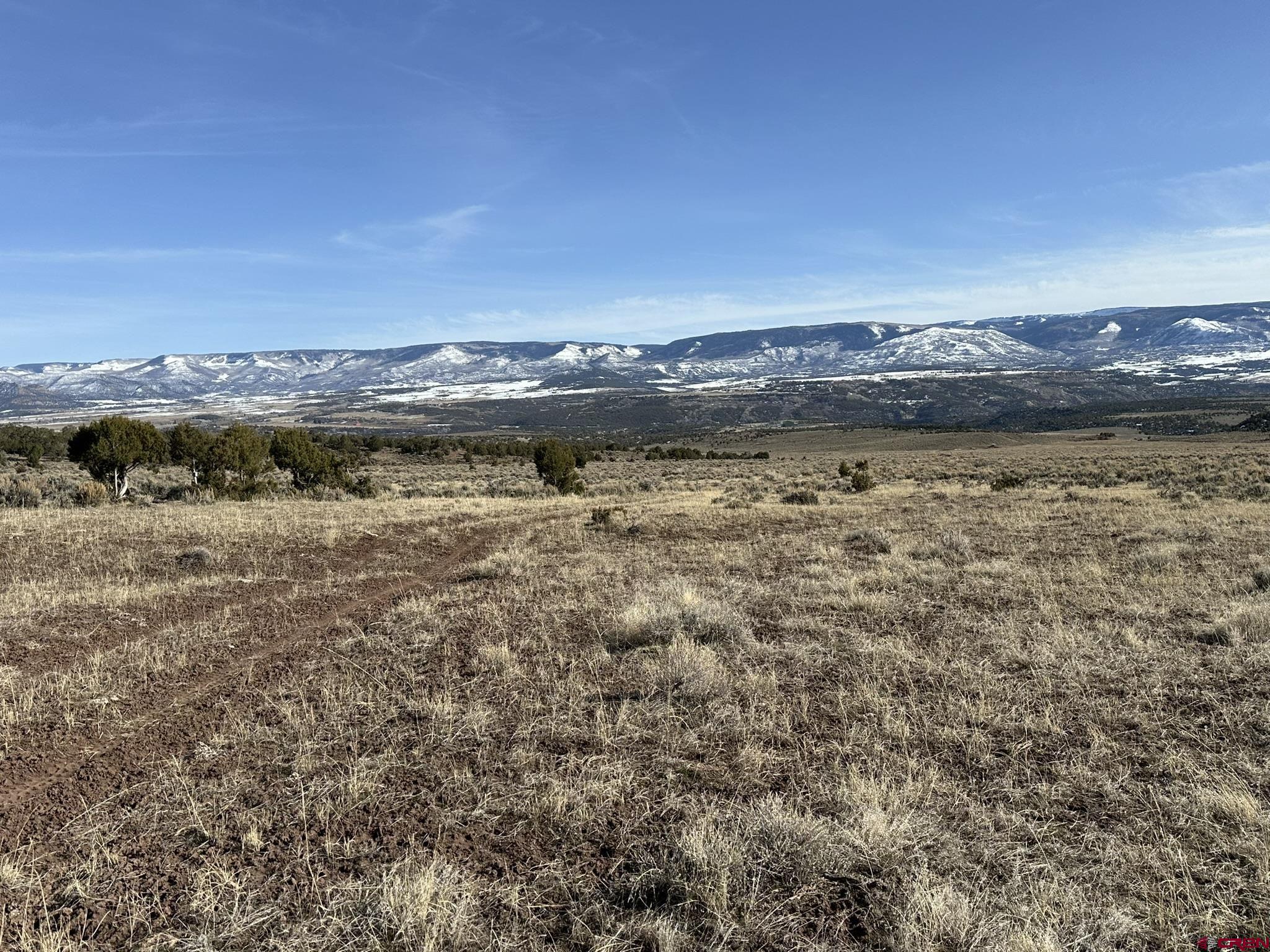 Tbd V Road De Beque, CO 81624 - Photo 13 of 22 a view of lake with mountain