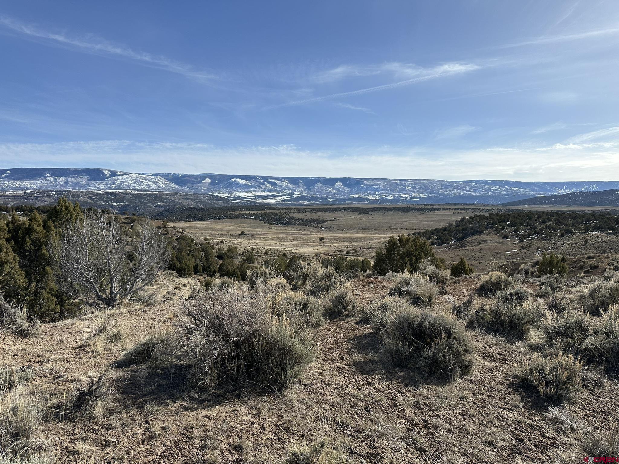 Tbd V Road De Beque, CO 81624 - Photo 8 of 22 a view of a lake with a mountain