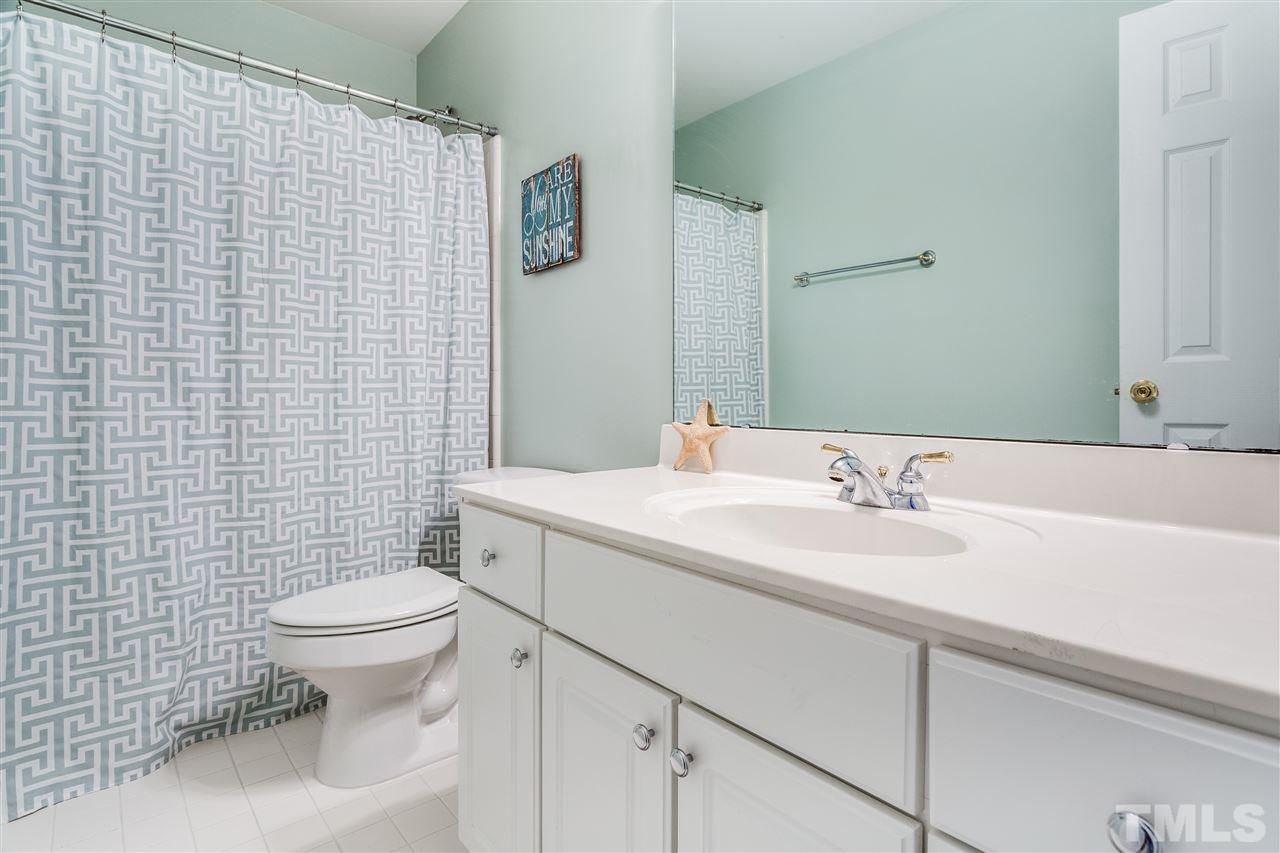 2737 Sunnystone Way Raleigh, NC 27613 - Photo 20 of 24 Family Bathroom with updated fixtures and paint.