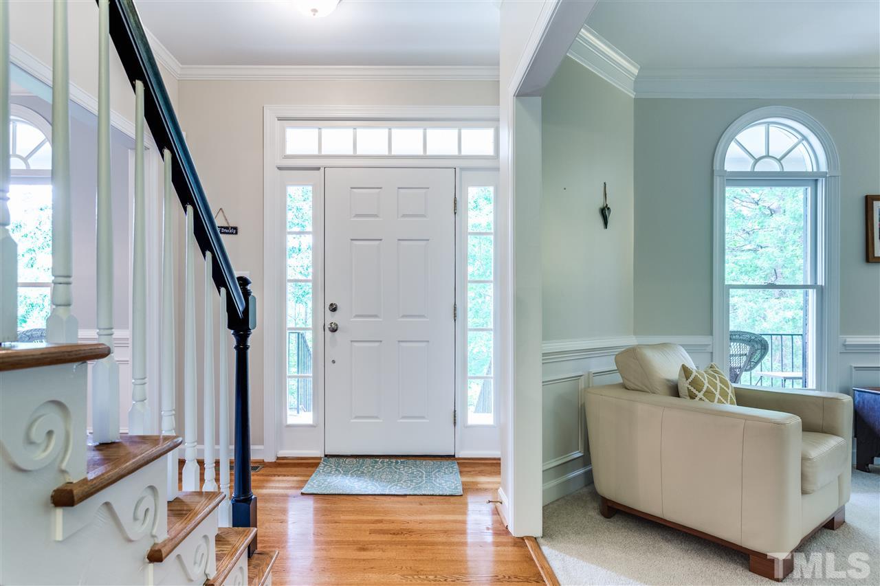 2737 Sunnystone Way Raleigh, NC 27613 - Photo 3 of 24 Beautiful entryway with hardwood flooring.