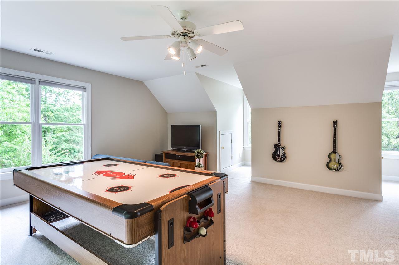 2737 Sunnystone Way Raleigh, NC 27613 - Photo 21 of 24 Large bonus room, perfect for games or homework.