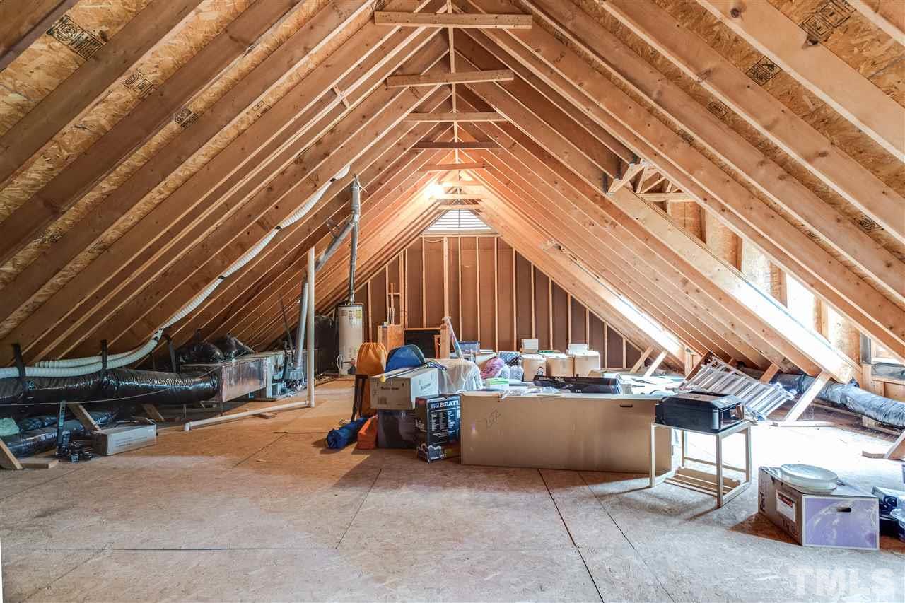 2737 Sunnystone Way Raleigh, NC 27613 - Photo 22 of 24 Walk up, floored attic, ready to be finished.