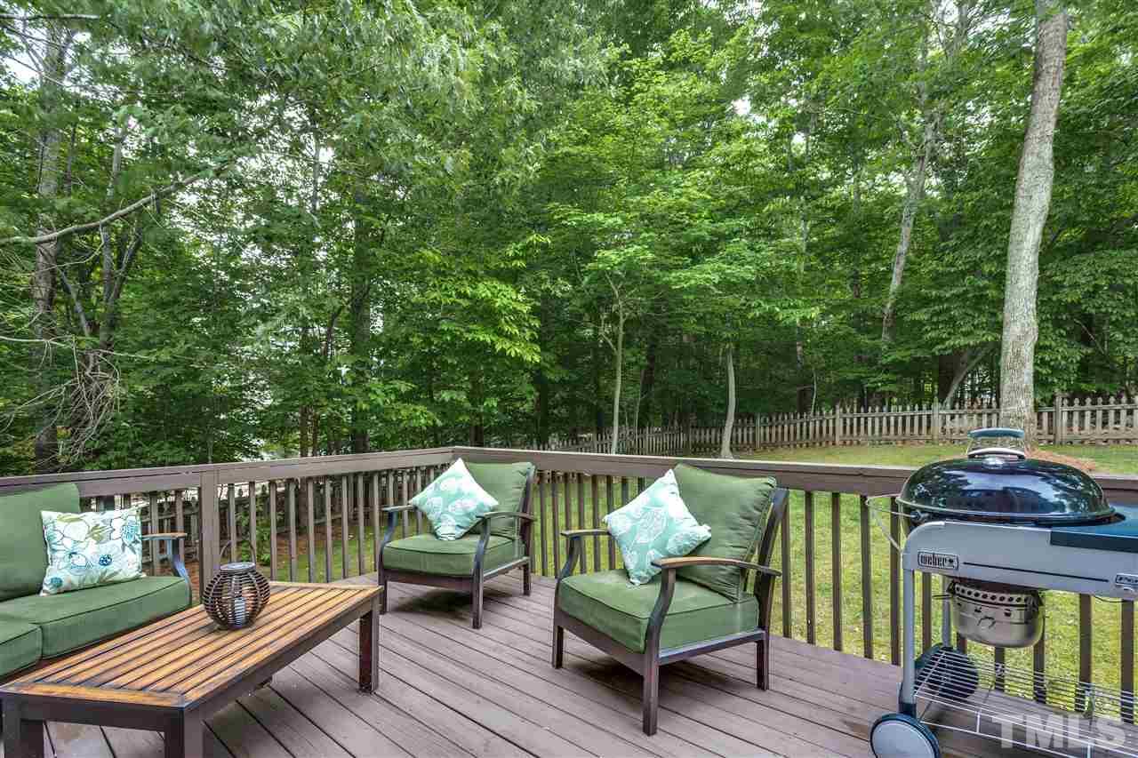 2737 Sunnystone Way Raleigh, NC 27613 - Photo 23 of 24 Enjoy entertaining or a cup of morning coffee from the privacy of your deck.