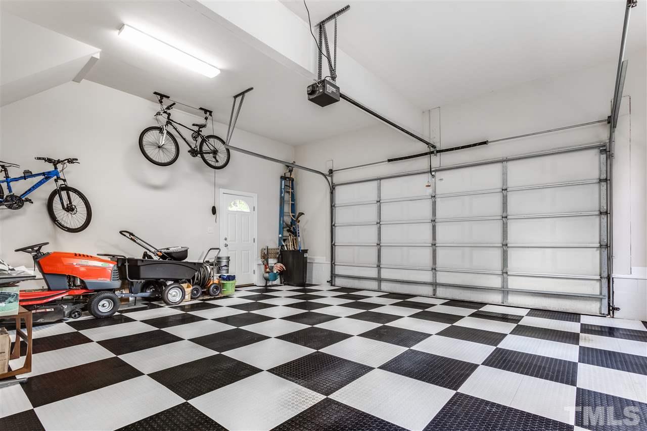 2737 Sunnystone Way Raleigh, NC 27613 - Photo 24 of 24 Garage with racedeck flooring.